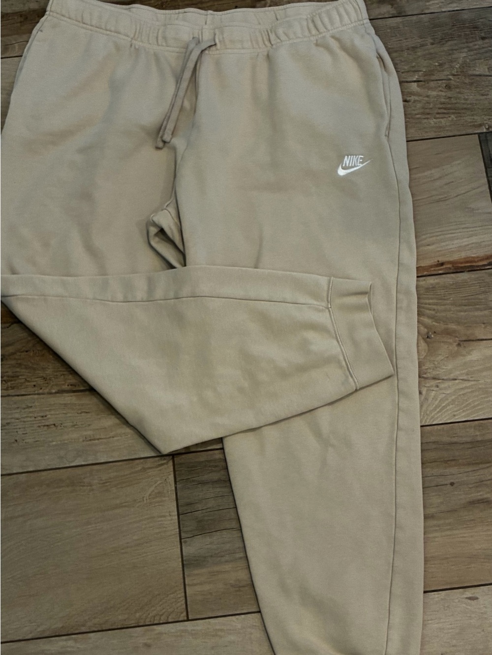 Nike men’s Beige/Tan Jogger Sweatpants with White Logo